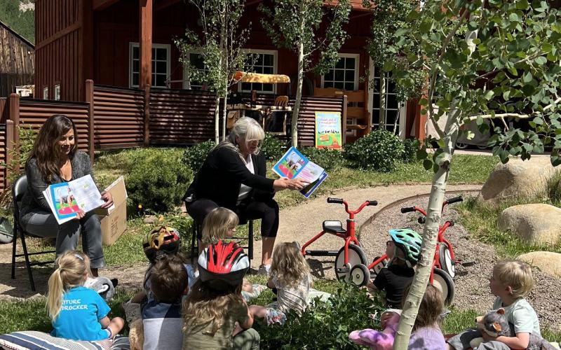 SFLC is a lifeline to many local families in the workforce In summer of 2023, local author Nancy Brockman and illustrator Lisa Morales read their children’s book Naughty Dogs to the preschoolers. Photo credit DeAnne Gallegos