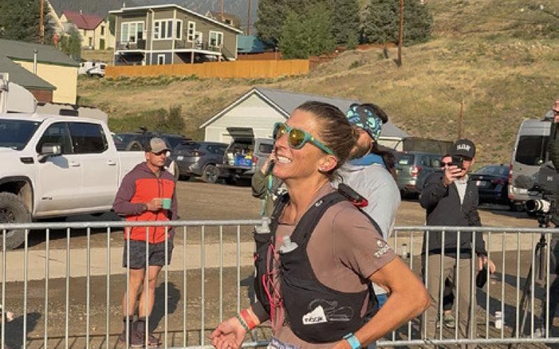 Courtney Dauwalter coming into the Hardrock 100 finish line in front of the Silverton School Gym Photo by DeAnne Gallegos