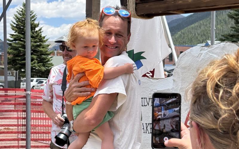 Durango’s Jason Schlurb the day before the race with his daughter. He came in 16th mens finisher Photo by DeAnne Gallegos
