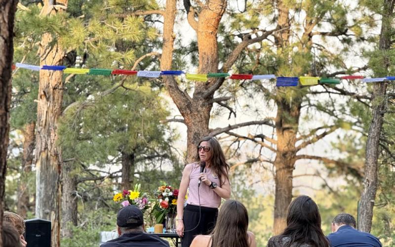 Silverton’s Megan Hicks gave an endearing speech at Megan’s memorial honoring her professional running career photo by DeAnne Gallegos