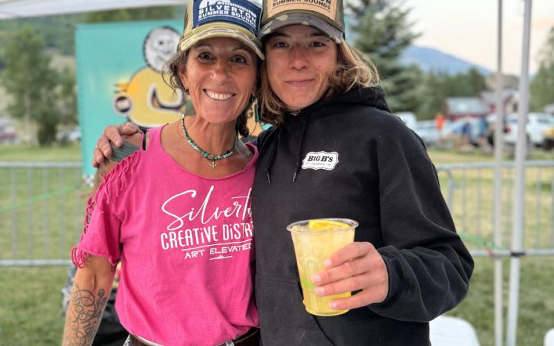 Chris and her daughter Ellie work the Silverton Summer Sounds tent together on Friday night photo by DeAnne Gallegos