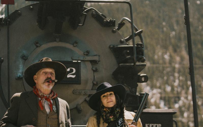 Tom Dragt from Durango and local Misha Garcia dressed in their western best photo by Critt Kuenning