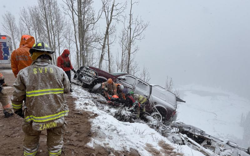 A photo of the vehicle and camper over the edge on highway 550. Photo credit Silverton Medical Resuce