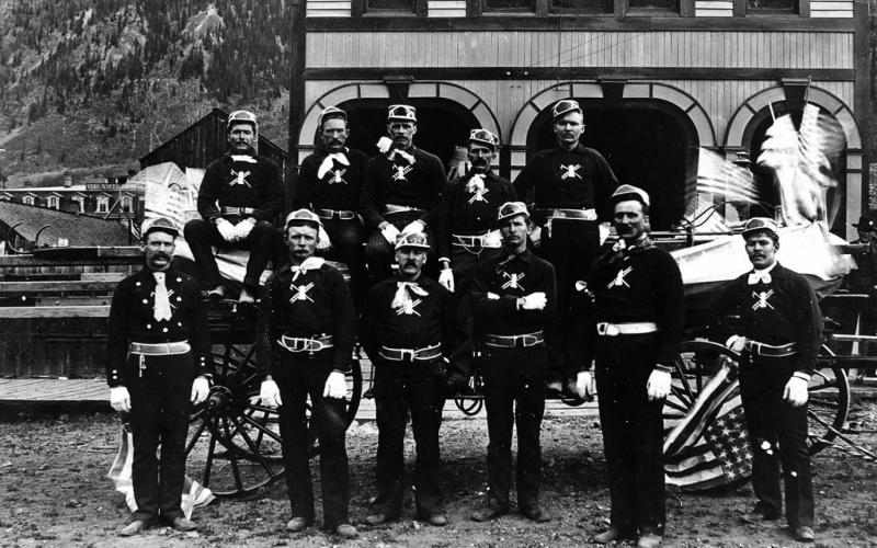 The Silverton Volunteer Fire Department posed in front of the old Town Hall on Blair Street on July 4, 1891. The San Juan County Historical Society is seeking old photos of the building, particularly showing the upper front of the structure, for a historical assessment. If you have one, please send it to Bev Rich, bevrich@frontier. net or call 387-5781. Photo: San Juan Historical Society