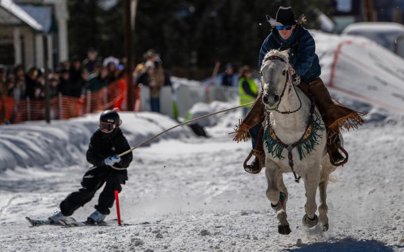 A skier makes a tough gate behind a fast-footed partner (2025). Photo by Wesley Berg