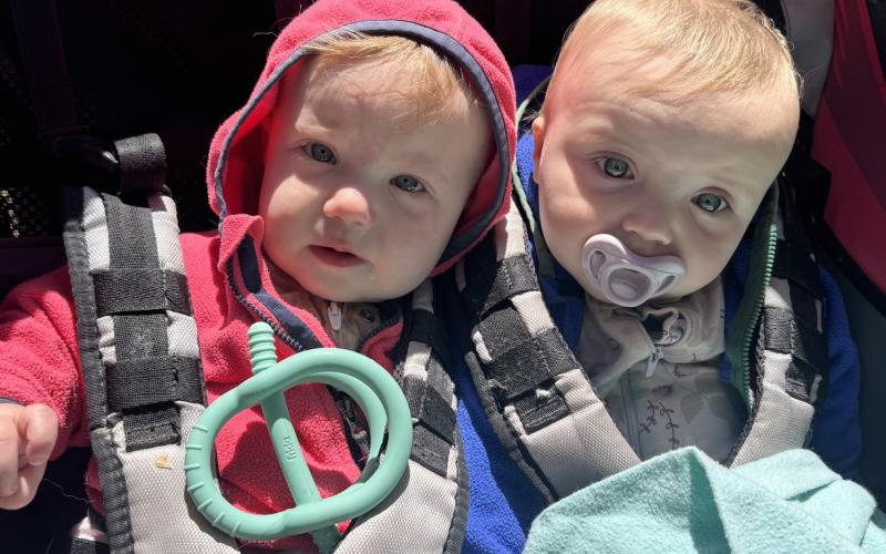 Twins Rudie and Saoirse Fetchenhier-McChesney out for a walk in the chilly springtime air Photo by Katey Fetch