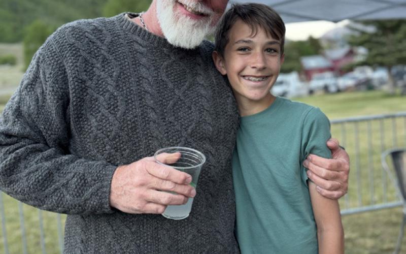 Bruce Conrad and Rebecca Bertot’s son Austin Middour, who was visiting from Texas, at the Silverton Summer Sounds concert Friday night photo by DeAnne Gallegos