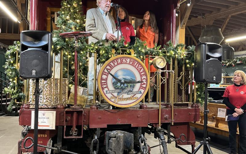 (L to R)- Richard Ballantine owner of Durango Herald, Former Senator Ellen Roberts and former Mayor of Durango Christine Renderlie present to crowd off of Al Harper’s private car parked in the DSNGRR Museum. Photo credit DeAnne Gallegos