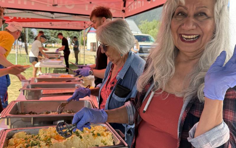 Lucy Walco, owner of Natalia’s, serving breakfast in Memorial Park on Sunday morning for the Hardrock 100 awards ceremony photo by DeAnne Gallegos