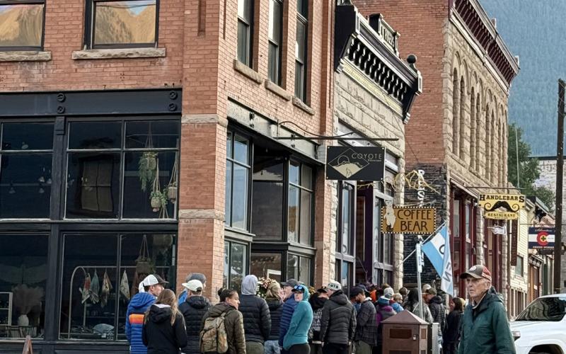 Friday morning, right after the Hardrock 100 start at 6 am, the line of people trying to get a cup of coffee at Coffee Bear went into the street photo by DeAnne Gallegos