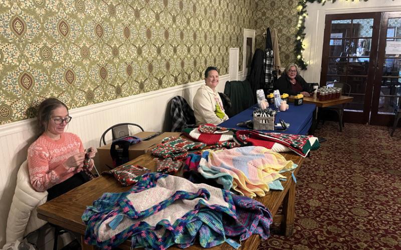 Local vendors Miranda Mandie, Kelli Fries and Keri Metzler at the Christmas Bazaar photo by Scott Fetchenhier