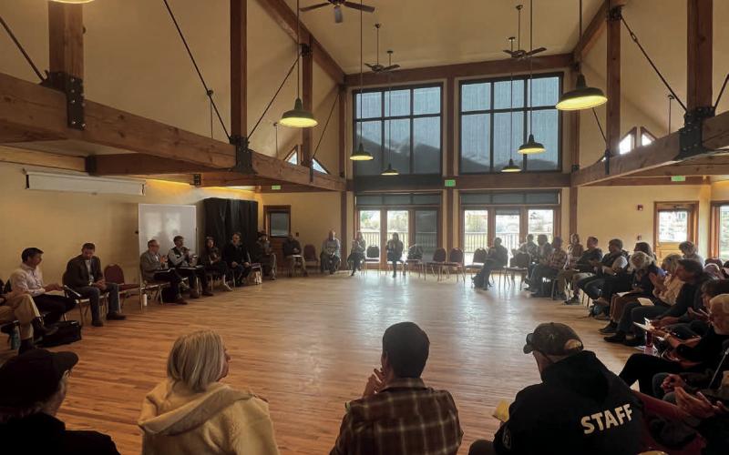 Room full of locals at Kendall Mountain Community Center listening to Attorney General Weiser. Photo credit DeAnne Gallegos