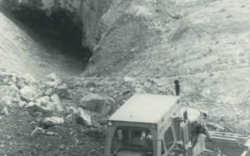 Photo Courtesy of San Juan Historical Society In this June 1978 file photo, bulldozer operator Andy Archuleta moves earth at what had only days earlier been Lake Emma. The lake drained into the Sunnyside Mine on June 4, 1978, 35 years ago this week. Above, the Sunnyside Mine complex at Lake Emma.