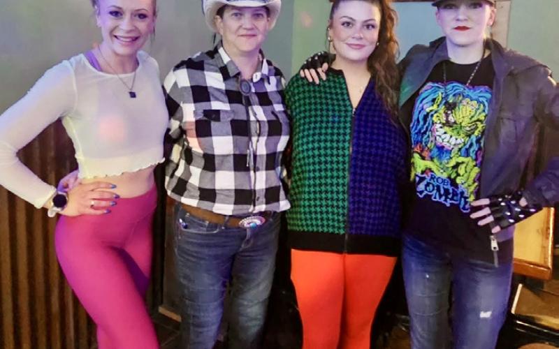 The Alpine Tavern had an 80’s night, and the staff were dressed for the party. Owner Shiloh Sams, staff Kelli Fries, Natalie Streeter, and Britanny Yamagiwa photo by Alpine Tavern
