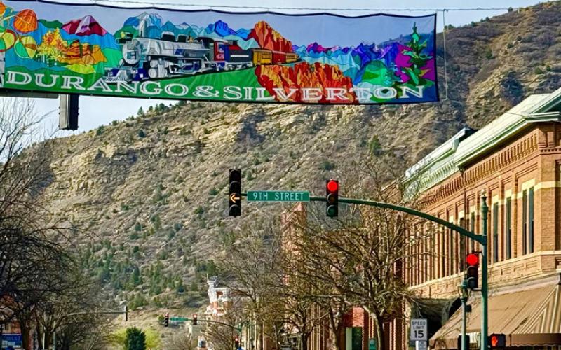 (TOP) photo by DeAnne Gallegos Downtown Durango shares some love for Silverton on a new banner crossing Main Street