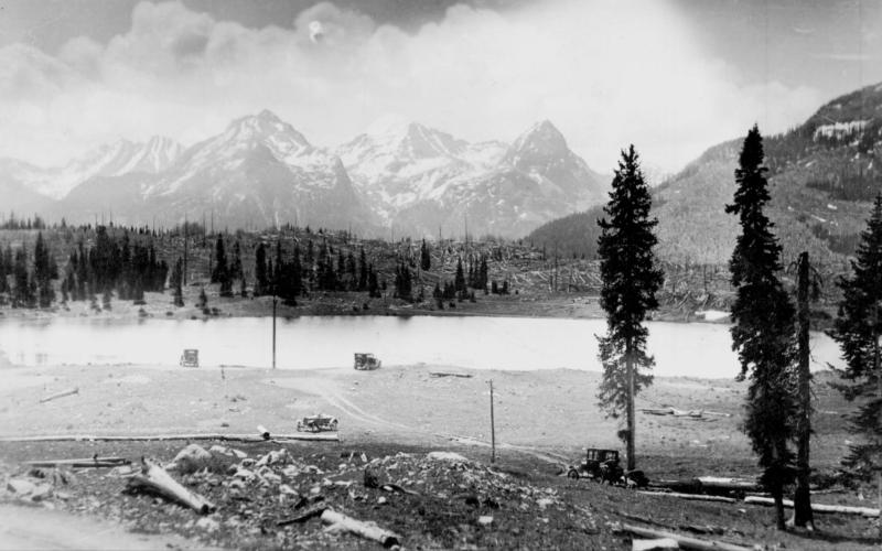 Molas Lake and surroundings around 1930, looking easterly into the Grenadier Range. Includes four automobiles. Very little development, and whatever improvements may have existed then must has been just out of the scene at the left. San Juan County Historical Society photo