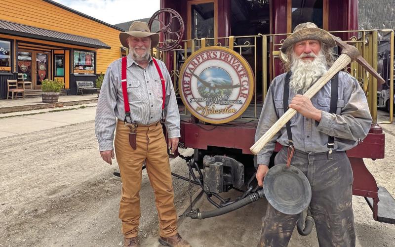Roi Meiworm and Wayne Peterson of Durango came up to greet the train as miners. Photo credit DeAnne Gallegos