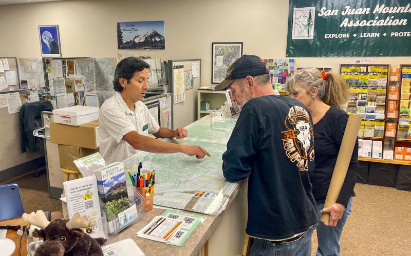 Shoppers at at SJMA bookshop. Photo credit SJMA