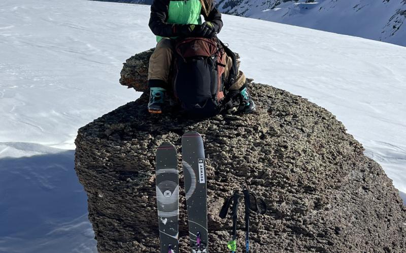 Griff Pinto taking a ski break while sitting on top of the San Juans. Photo credit Cliff Pinto