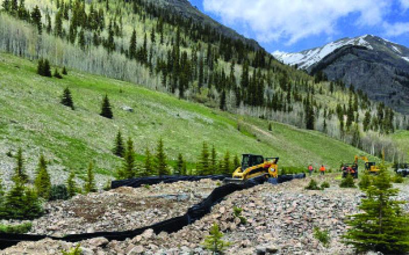 Repository construction on tailings Impoundment 4 Photo by EPA