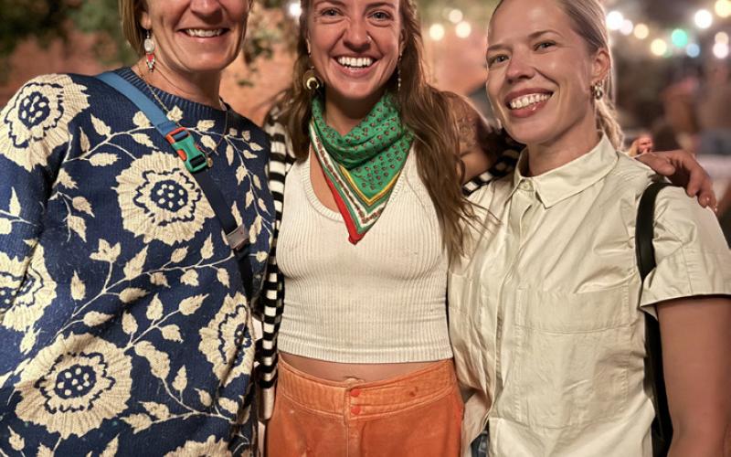 Photo by DeAnne Gallegos Anne Izard, Holly Huebner &amp; Allyn Robinson are all smiles enjoying each other’s company and listening to local live music in the Wyman Courtyard.