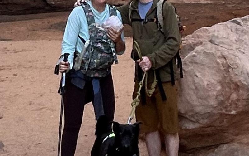 Molly, baby Moose, husband Chandler and Bill the dog camped in Moab shortly after Moose was born