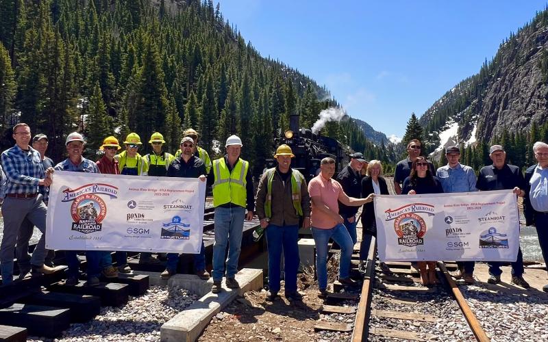 VIP group, Harper Family, DSNGRR leadership and rail crew all celebrate the inaugural steam train over the newly constructed Animas Bridge just south of town. Photo credit DeAnne Gallegos
