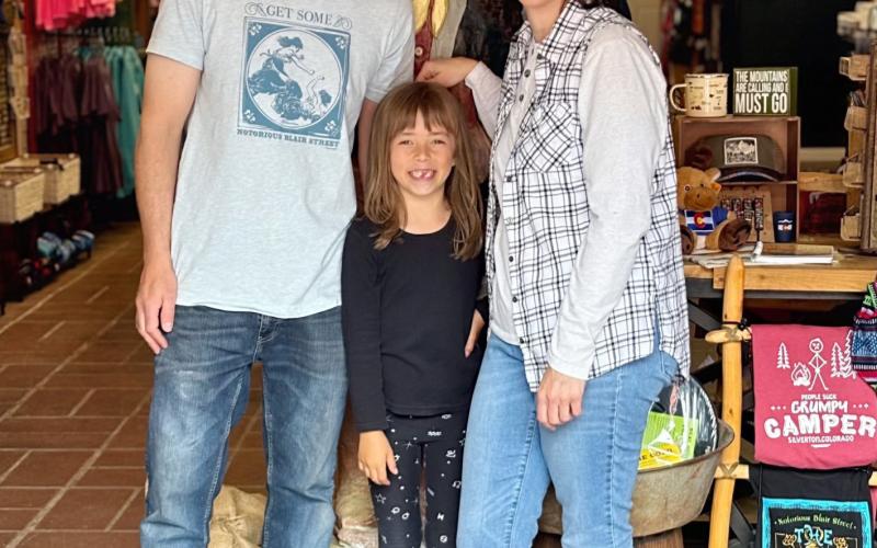 Wyatt Carmack, Anyela Carmack, and Gina Rosato pose with the old miner. Photo provided by Gina Rosato