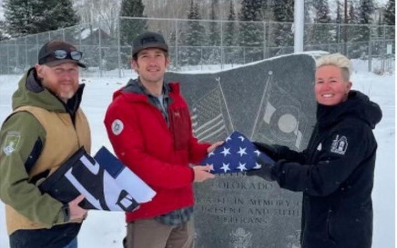 SASTAC founders Michael Ackerman and Josh Jespersen donated new flags to TOS Parks &amp; Rec Director Sarah Friden. Photo credit SASTAC