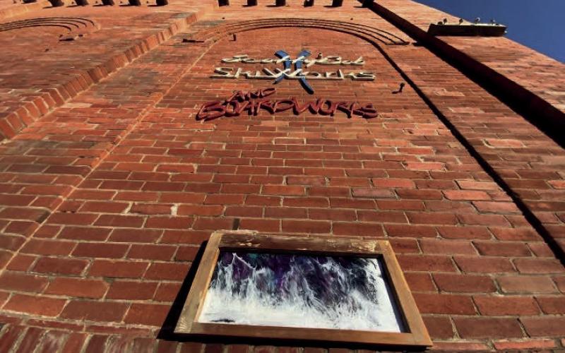 Artist Hillary Cable’s work displayed on the brick of the Power House. Photo by Hillary Cable