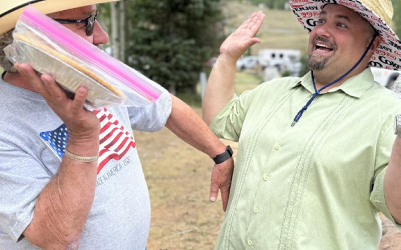 SJC Eureka “Mayor” George Riley throws a pie at Silverton Mayor Jim Harper, photo by DeAnne Gallegos