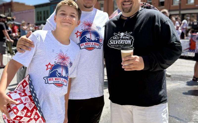 Silverton Mayor Jim Harper enjoys the parade with his sons Sammy &amp; Charlie photo by DeAnne Gallegos