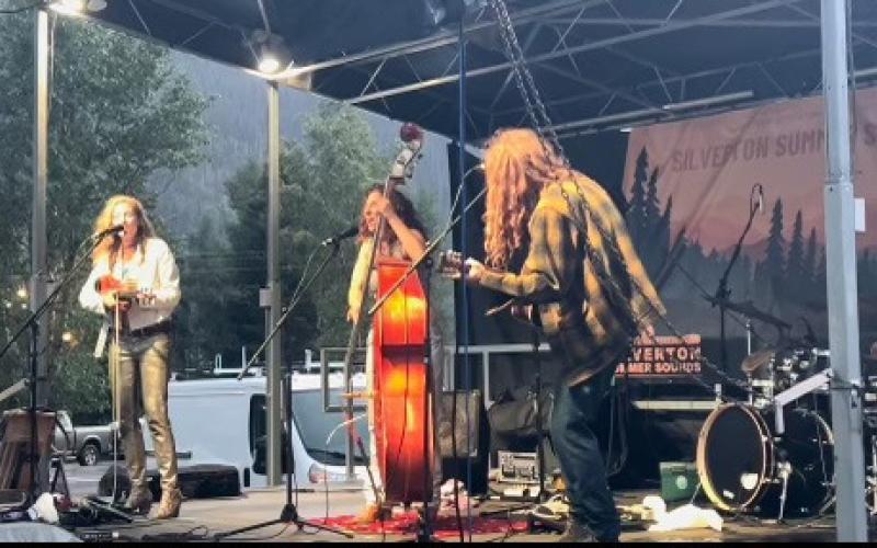 Sweet Lillies play in the rain during Silverton Summer Sounds. Photo credit DeAnne Gallegos
