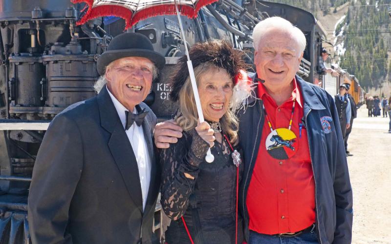 Richard Wilcox and “Miss Kitty” pose with Al Harper, the owner of the Durango Silverton Narrow Gauge Train, on the first day of the season. Photo credit Ray Dileo