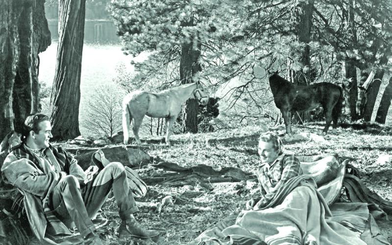 Actor Mark Stevens as Jeff Keane and Coleen Gray as Joan Hartley camping out in a scene from the 1949 movie “Sand.” The movie, much of which was filmed in the Silverton area, was shown Friday and Saturday nights, Aug. 31 and Sept. 1, 2012, as part of the first-ever Silverton Western Movie Festival. Photo courtesy of San Juan County Historical Society