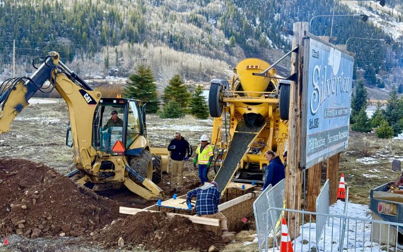 TOS Public Works crew pouring concrete for sign pole footers on Tuesday