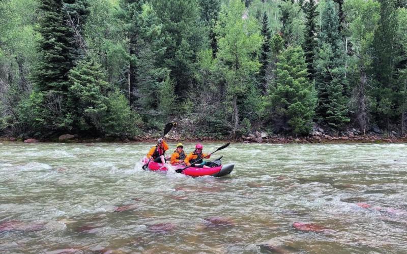 SAR team crosses Animas River in the 10-mile creek area. Photo Credit Silverton Medical Rescue