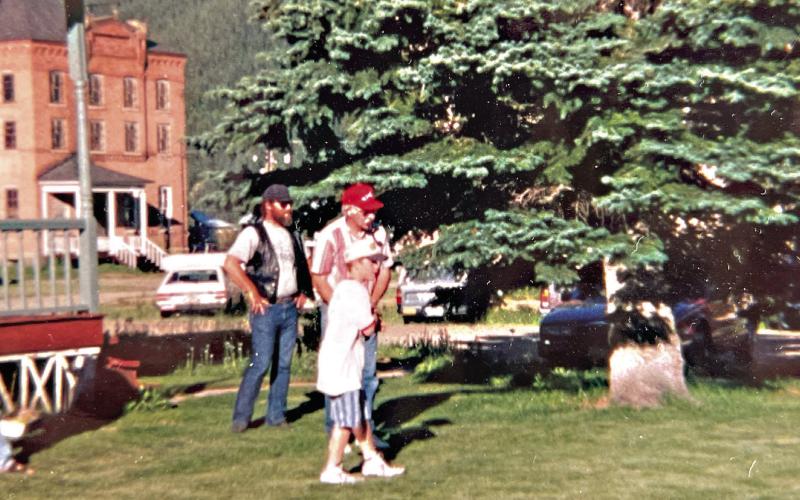Zeke Zanoni teaching a youngster the rules of Silverton Bocce. Photo credit the Zanoni Family