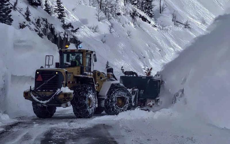 CDOT working to clear the road. Photo by CDOT