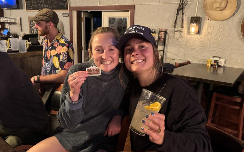 photo by Sarah Moore Silverton locals Natalie Platt &amp; Lucy Mulvihil celebrate with SJDA with a party thrown at the El Bandito by showing off the new sticker featuring the sign.