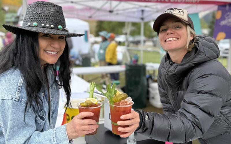 photo by DeAnne Gallegos Angelina Noble and Silverton Creates volunteer Caroline Williams showcase the bloody mary special at the Art Festival.