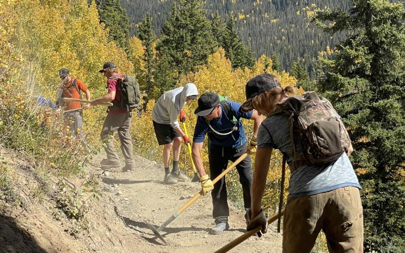 Volunteers working on the Baker’s Park trail. Photo credit Silverton Singletrack Society