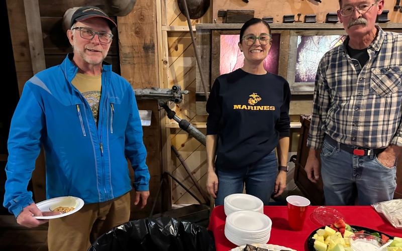 Phil Antonelli, Silverton Librarian Misti Anderson and San Juan County Veterans office's Gary Davis enjoy the nice appetizer spread at the Veteran's Museum Night Photo by Ray Dileo