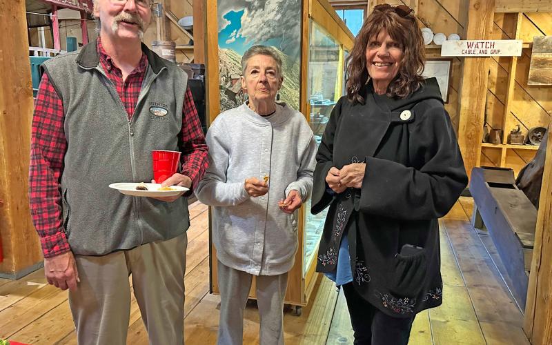 San Juan County Historical Socitey Board members Scott Fetchenheir and Beverly Rich mingle with San Juan County Historical Society Archievist Casey Carol Photo By Ray Dileo