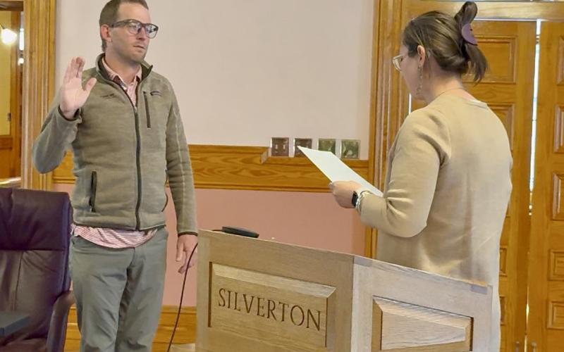 Photo by DeAnne Gallegos Newly appointed Town of Silverton Trustee Christopher Brosh was sworn into office by San Juan County Judge Kelly Tompkins Monday April 13, 2026