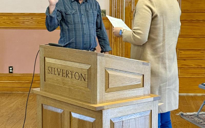 Photo by DeAnne Gallegos Newly appointed Town of Silverton Trustee Dr. David Brown was sworn into office by San Juan County Judge Kelly Tompkins Monday April 13,2026