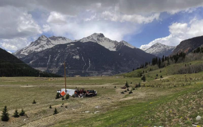 View of the top of TP4 prior to the start of earth work with construction trailer in foreground