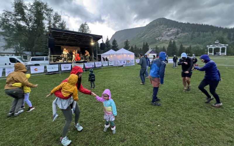 Silverton locals dancing in the rain at Summer Sounds. Photo credit Katey Fetch