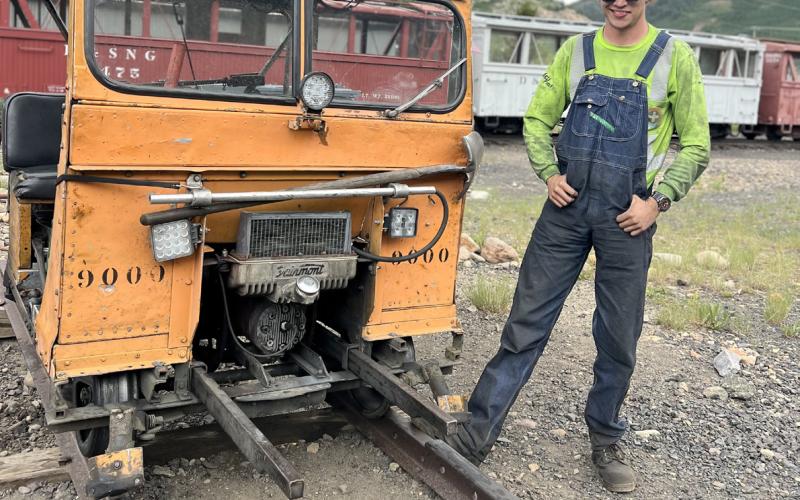 Jake Dierking poses next to his beloved vintage pop car after interviewing for this story. Photo credit DeAnne Gallegos