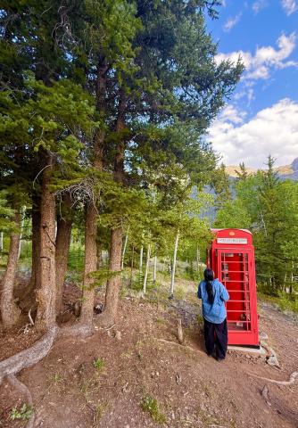 It has been one year since Silverton Local Nancy Brockman passed away. Angelina Noble paid her respect at the now well-known Windphone. People have come from all over to use the Windphone to call their loved ones who have passed. Photo by DeAnne Gallegos